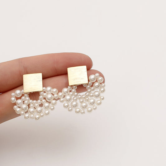 Handmade woven wavy pearl stud earrings