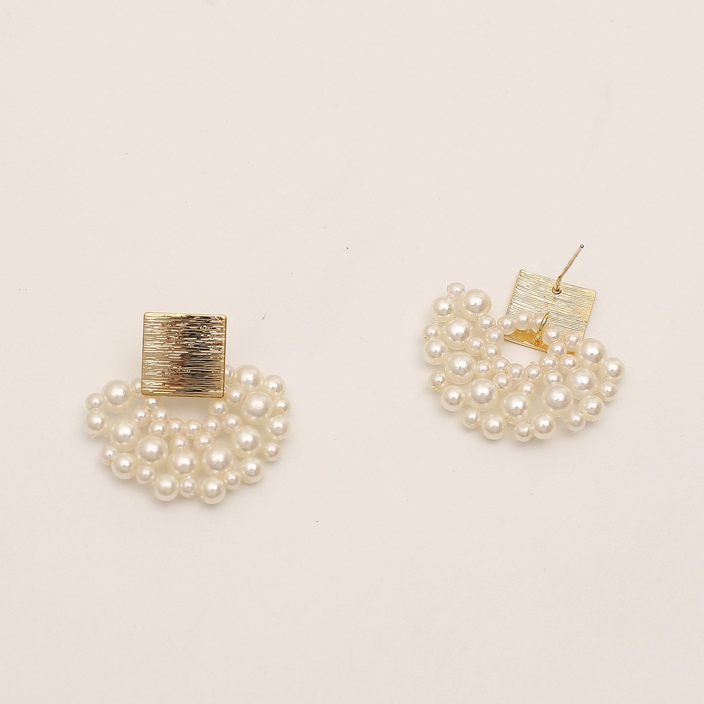 Handmade woven wavy pearl stud earrings