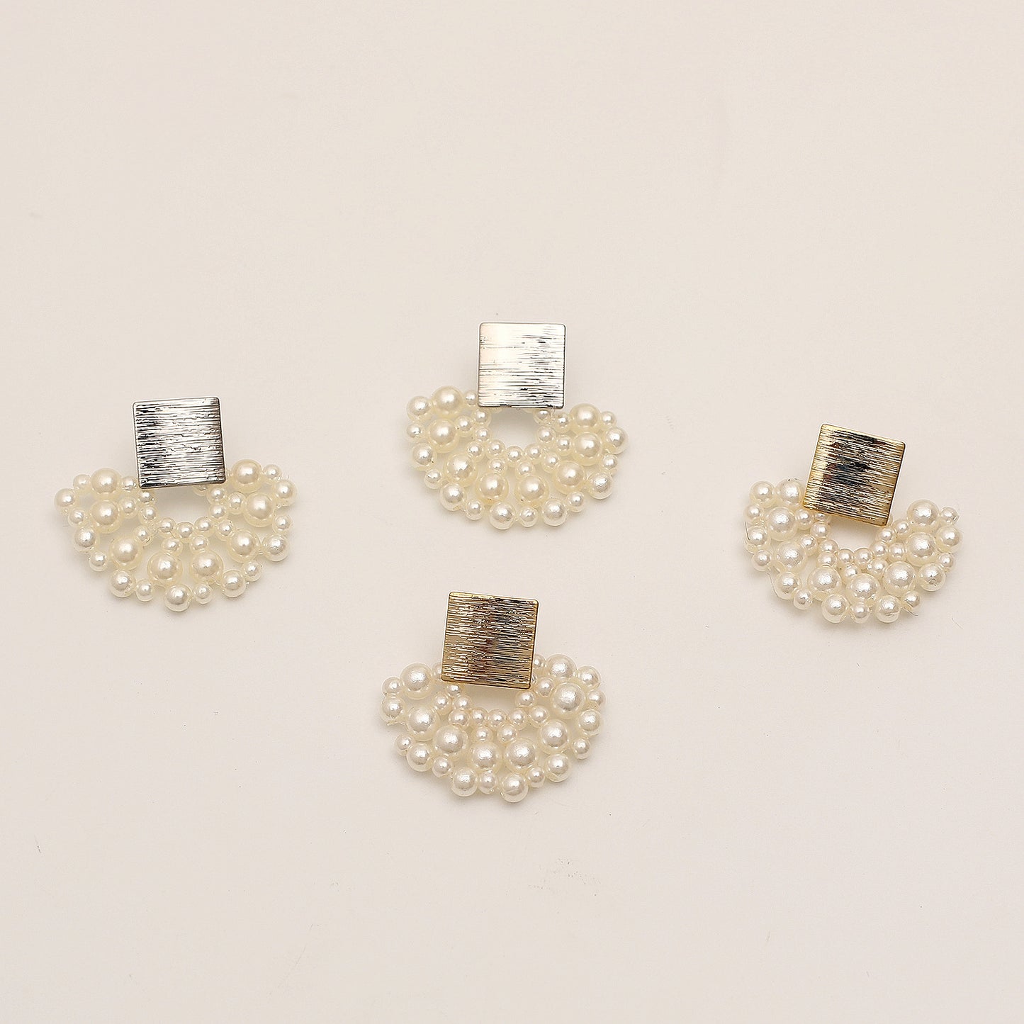 Handmade woven wavy pearl stud earrings